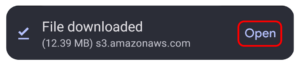 A picture of an Android notification showing an underlined checkmark and text that says File downloaded next to an Open button